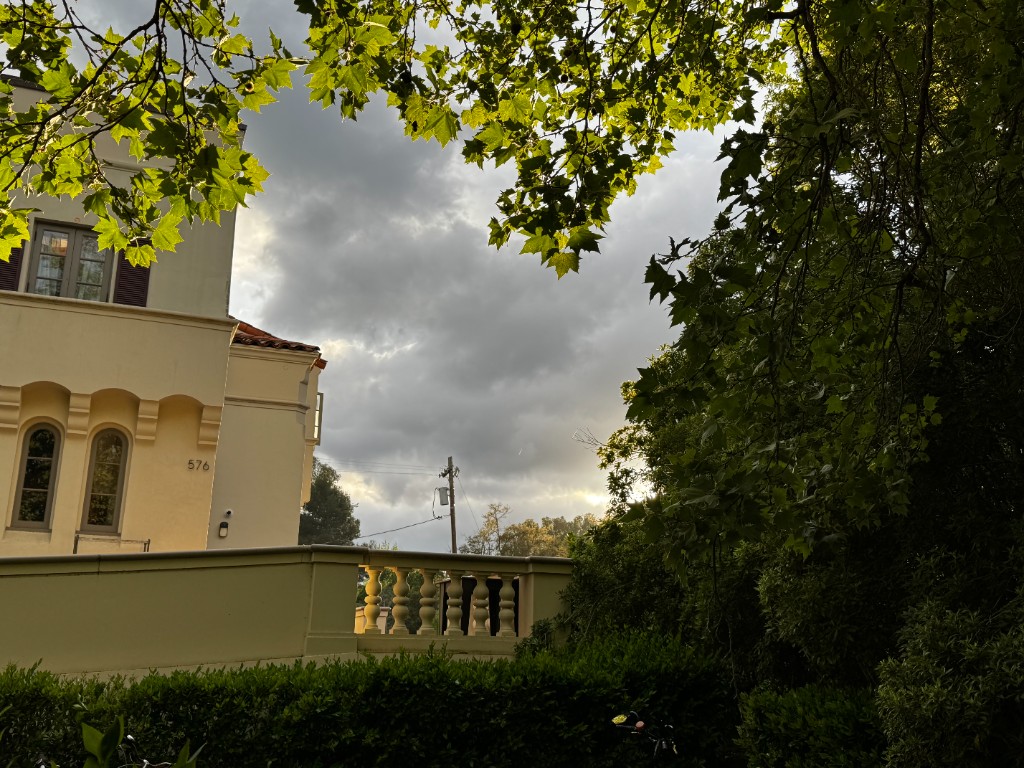 Stanford campus building under a cloudy sky