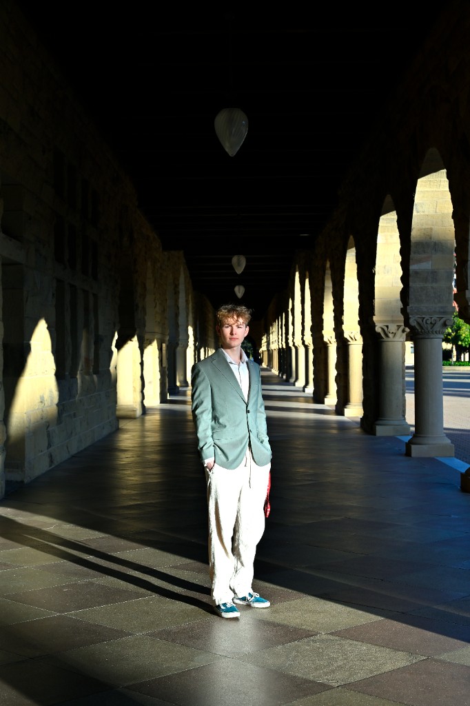 Standing in the Stanford Main Quad colonnade